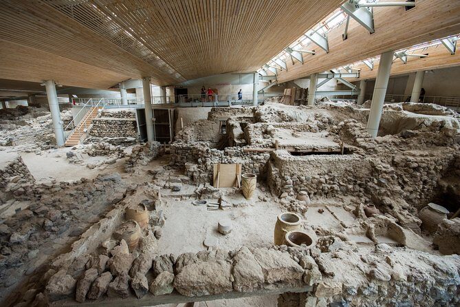 Archaeological Bus Tour to Akrotiri Excavations & Red Beach - Megalochori village: earthquake charm and photo-worthy streets