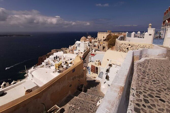 Authentic Santorini: A Self-Guided Audio Tour of Oia - Naval Maritime Museum area: warm-up stories near the waterline