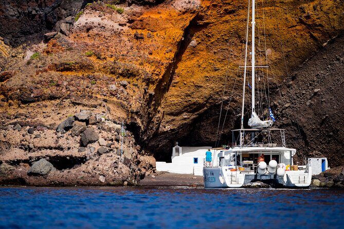 Beautiful Day Catamaran Caldera Cruise incl. Meal & Drinks - Stop 1: Santorini Volcano and the hot springs swim window