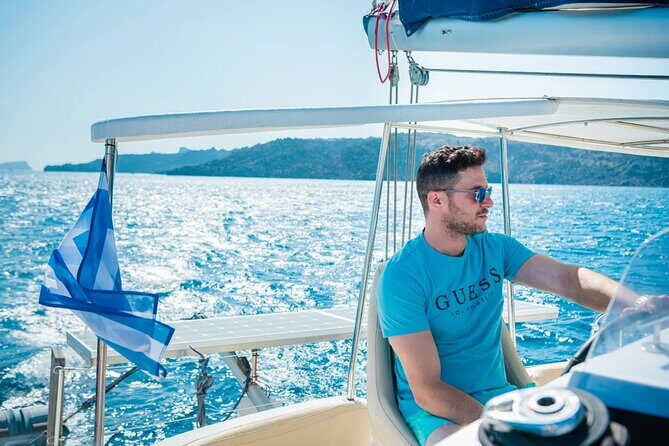 Best of Santorini Private Half-Day Catamaran Cruise with transfer and meal - Old lighthouse and Black Rock photos: the caldera’s signature angles