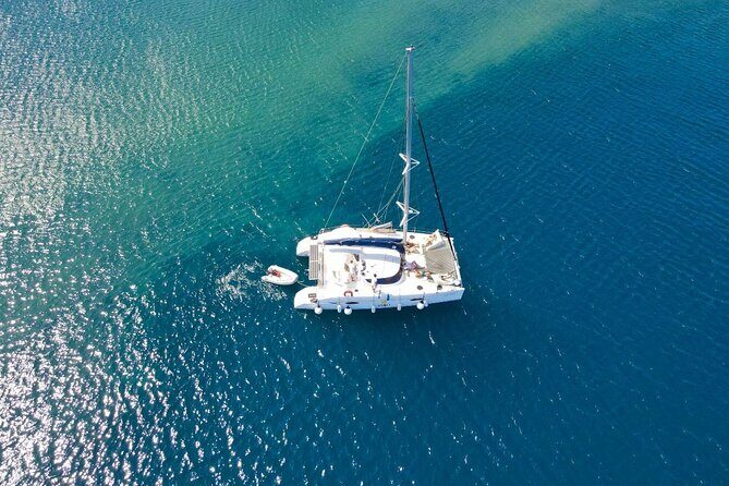 Best of Santorini Private Half-Day Catamaran Cruise with transfer and meal - Fira from the water: Immerovigli, Firostefani, and the Old Port of Fira