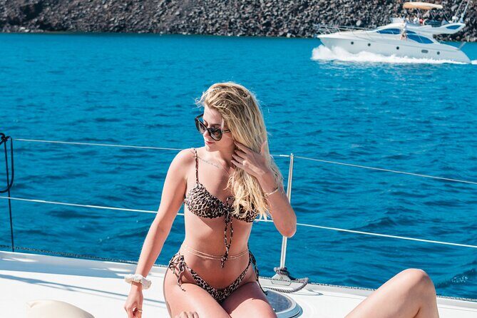 Best of Santorini Private Half-Day Catamaran Cruise with transfer and meal - Lunch or dinner at sea: food that keeps the day relaxed