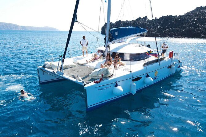 Best of Santorini Private Half-Day Catamaran Cruise with transfer and meal - Crew dynamics: guides, captains, and a day that flows