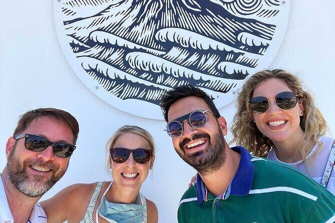 Best of Santorini Sightseeing Guided Tour 5h - Stop 1: Oia’s Blue Domes and the Postcard Shot Setup