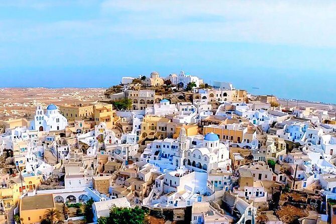 Discover Santorini’s Best in One Day - Megalochori’s 17th-century village feel: cave houses, church domes, and hidden alleys