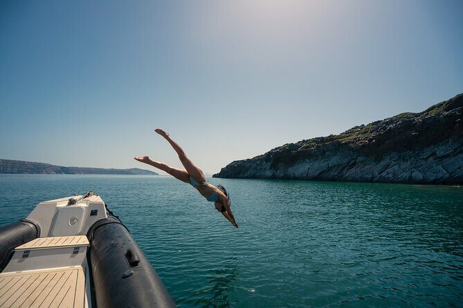 Exclusive cruise experience in Santorini - The Oia start: sunbeds, sea breeze, and your first caldera hit (15 minutes)