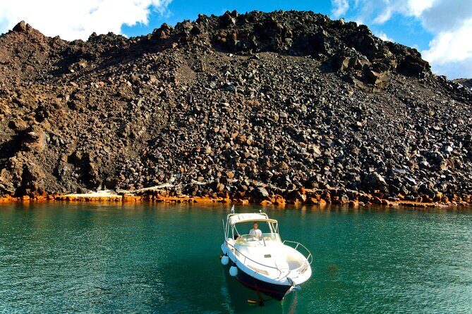 Explore Santorini and its volcanic wonders with Alex Private Boat - Thirassia swim/snorkel time: clear water and a real break