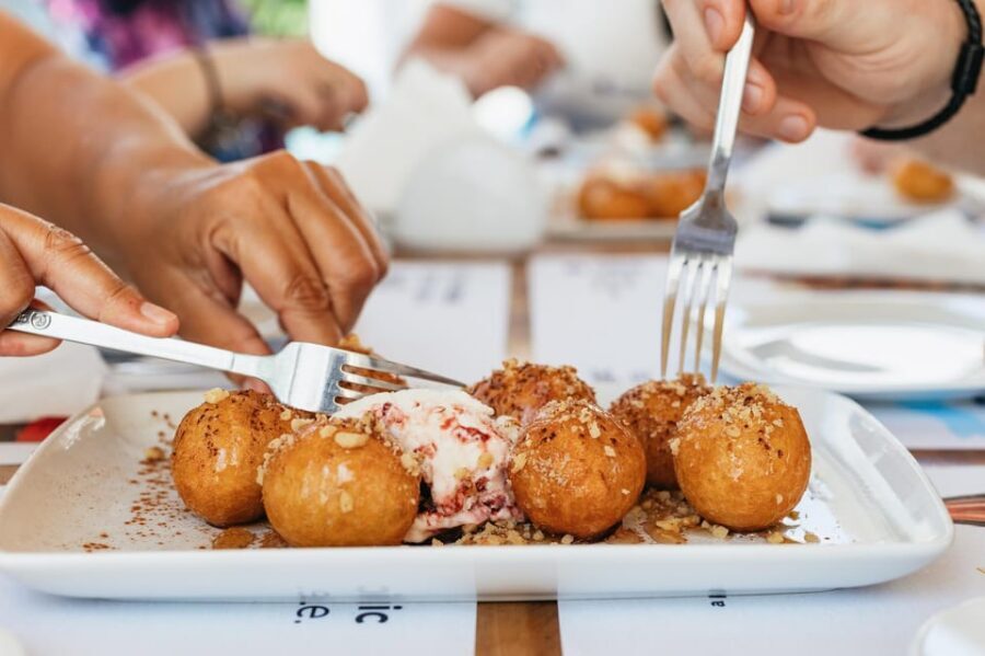 Fira: Guided Foodie Walking Tour with Tastings - Key highlights worth showing up for
