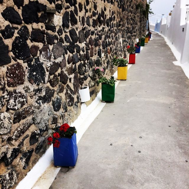 Fira: Guided Foodie Walking Tour with Tastings - The caldera-edge walk: volcano views and realistic photo stops
