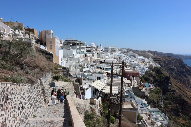 Fira Walking Tour: Explore Top Sights & Hidden Gems - The route: churches, bells, and that Fira cliff panorama