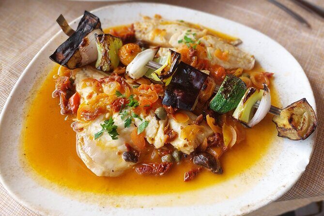 Flavors of Santorini Food and Wine Private Sunset Tour - Dinner at a family-run seaside tavern: what’s included and why it tastes more real