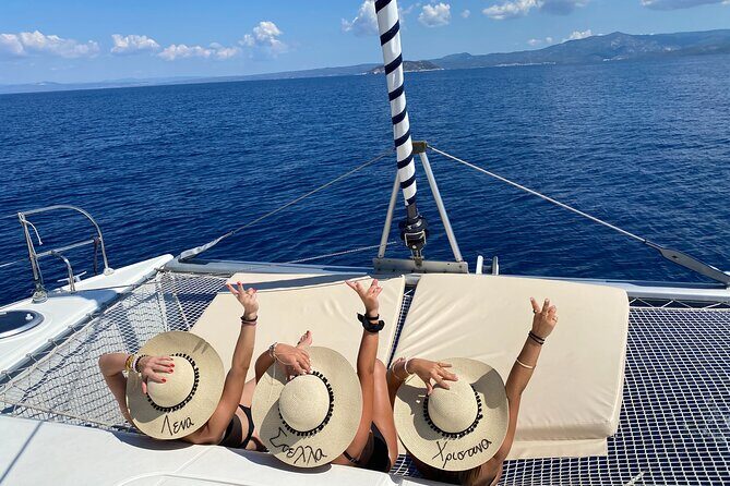 Full Day Santorini Catamaran Private Cruise with meal and transfer - Thirassia and Strogili/Aspronisi: a calmer caldera side trip