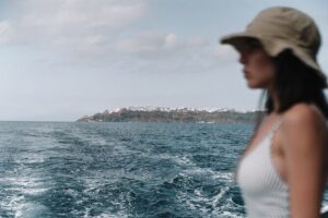 Half-Day Tailor-made Private Catamaran Cruise in Santorini - Limestone formations and crystal-clear water: the caldera’s quiet flex
