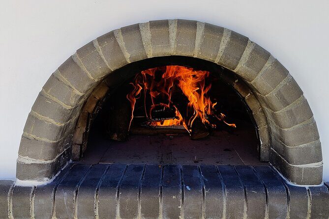 Half-Day Traditional Micro Restaurant in Santorini - Main course comfort: kontosouvli and lemon potatoes from the oven