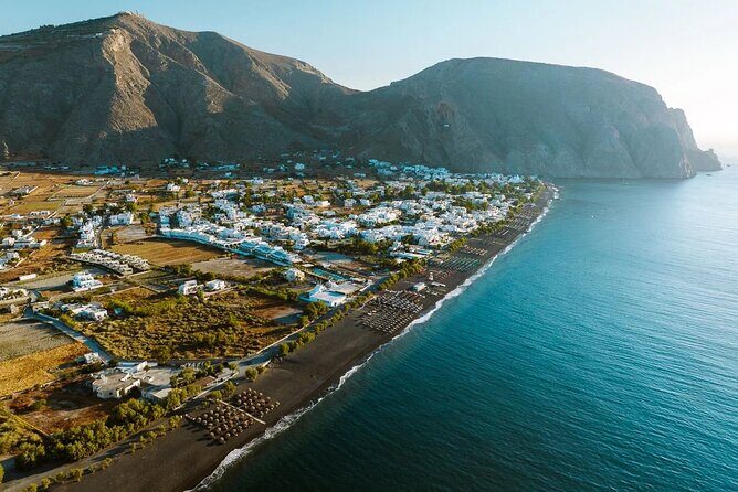 Luxury Full Day Private Sightseeing Tour in Santorini - Emporio and Perissa: windmill views and black sand relaxation