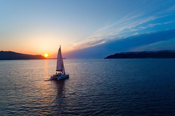 Luxury Sunset Cruise with Swim Stops, BBQ meals and Open Bar - Why this Santorini sunset cruise hits different