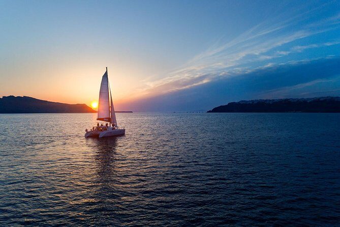 Luxury Sunset Cruise with Swim Stops, BBQ meals and Open Bar - Cruising the Caldera: volcano sights and hot springs along the way