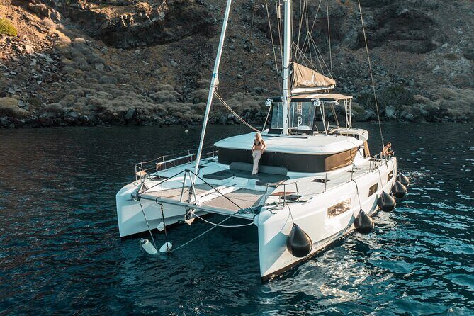 Majestic Catamaran Caldera Cruise with Snacks, Meal & Drinks - A 4½-hour caldera cruise that fits Santorini’s busiest days