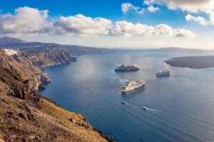 Majestic Catamaran Caldera Cruise with Snacks, Meal & Drinks - Santorini Volcano hot springs: the warm-up stop