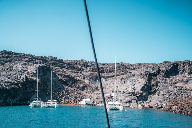 Majestic Catamaran Caldera Cruise with Snacks, Meal & Drinks - Red Beach: short time, big color
