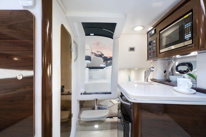 Motor Yacht (2020)Luxury Private Cruise Around Santorini - Old Port and the Aspronisi sunset moment