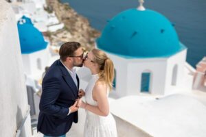 Oia: Couple photoshoot with 30 edited Photos - Choosing couple photos vs the flying dress: pick your Santorini vibe