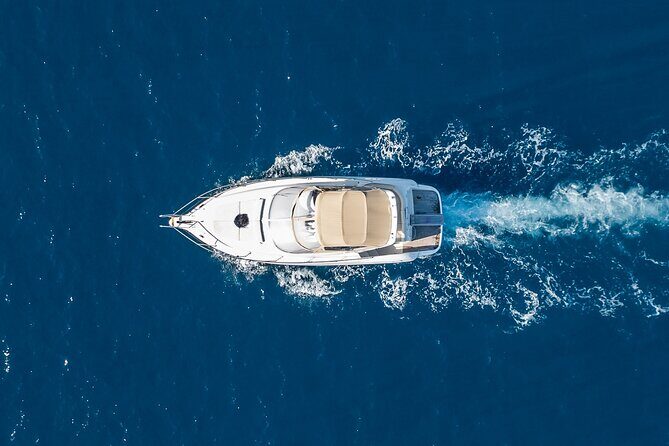 Private all included yacht Tour in Santorini - Sailing past Fira, Firostefani, Imerovigli, and the Old Port