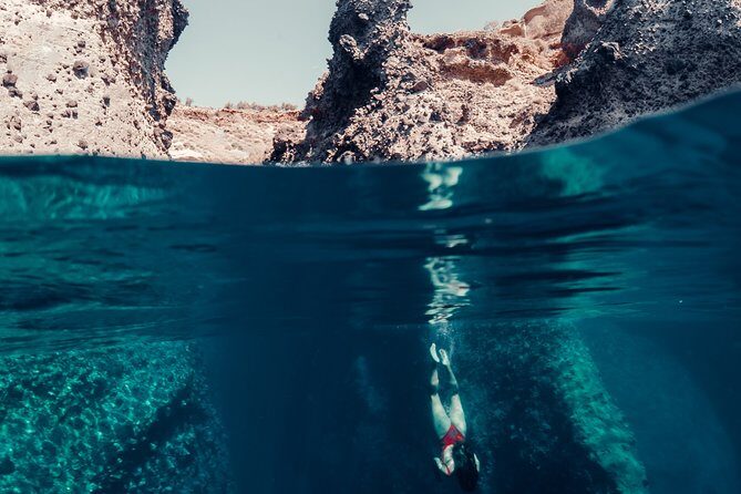 Private Beautiful Day or Romantic Sunset Cruise with Meal and Drinks - From the old fishing port of Oia to swimming over Santorini’s coastline