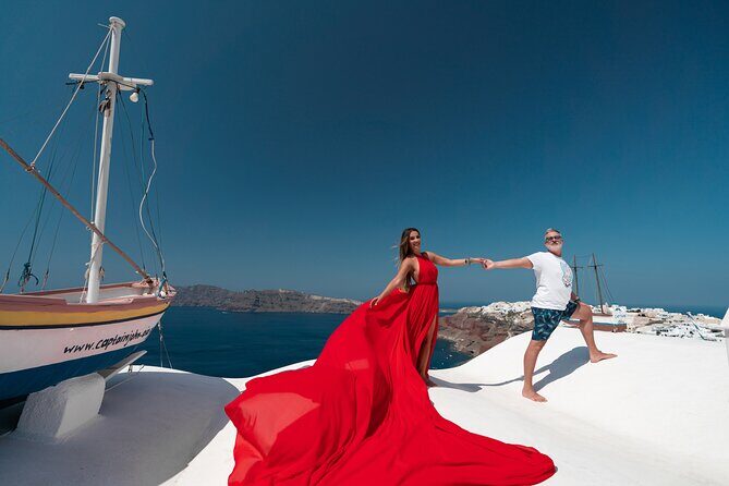 Private Flying Dress Photoshoot in Santorini - Your Photographer and Assistant: English Support and Real Posing Guidance