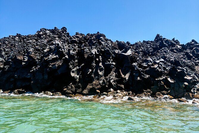 Private Full-Day Motor Yacht Cruise with Meal, Open Bar+Transfers - White Beach and its cove feel