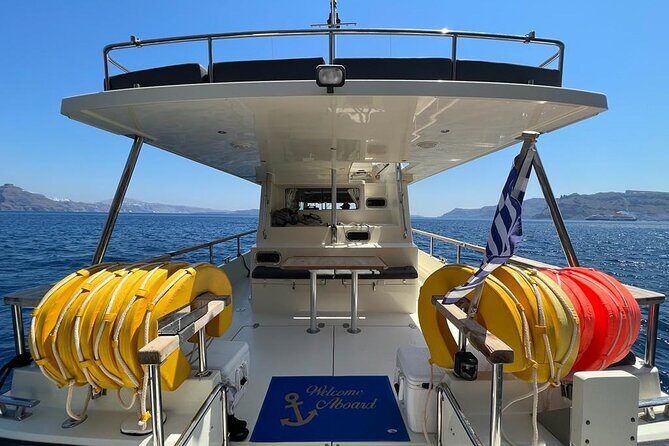 Private Full-Day Motor Yacht Cruise with Meal, Open Bar+Transfers - Palea Kameni: muddy sulfur, iron, and that volcanic-water experience