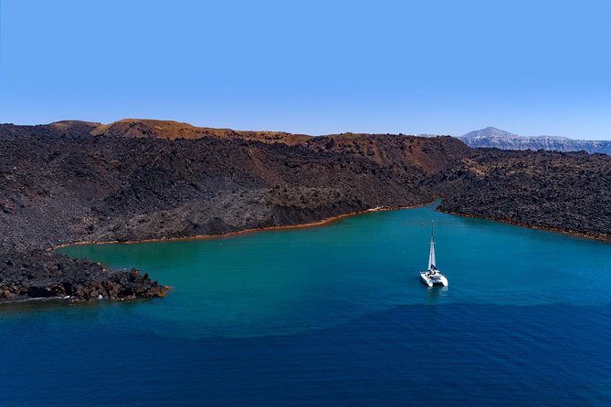 Private Luxury Caldera Cruise with a rich BBQ meal and Open Bar! - Snorkeling gear and real swim time: what to expect without guessing