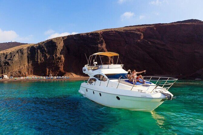 Private Motor Yacht Cruise with BBQ, Open Bar & Transfers - Stop 1: Red Beach at Akrotiri (Photos, Color, and a Short Break)