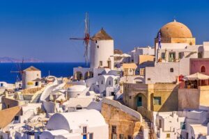 Private Oia Panoramic Scenes: Embrace the most picturesque village of Santorini! - Stop 1: Three Bells of Fira and the postcard balcony moment