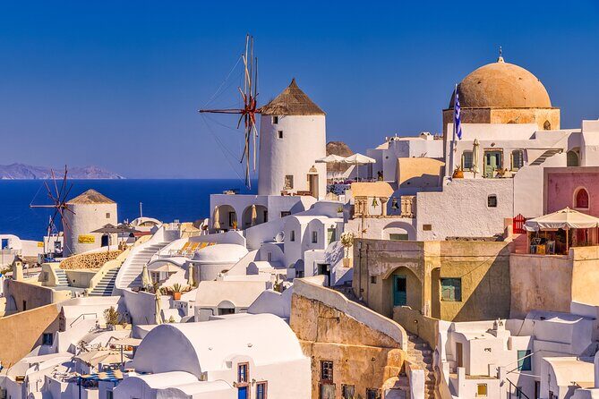 Private Oia Panoramic Scenes: Embrace the most picturesque village of Santorini! - Stop 1: Three Bells of Fira and the postcard balcony moment