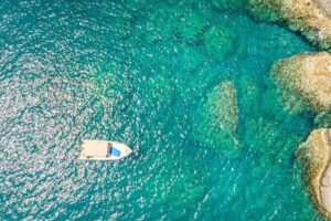 Rent a Boat in Santorini with Free License - Vlichada boat setup: GPS plotter, tracker, ladder, canopy