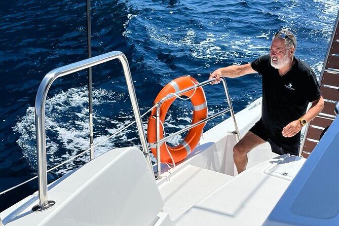Sailing Cruise in Santorini With Fairwind - Past the lighthouse and toward the caldera islands