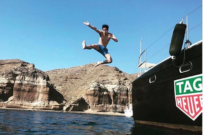 Santorini: Adventurous Catamaran Experience with Snorkeling - Pickup and start point: Thera and an air-conditioned ride