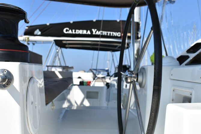 Santorini All-inclusive Private Catamaran Cruise - Thirassia island time: goggles-on swim in clearer water