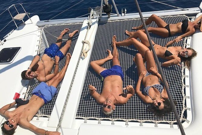 Santorini All-inclusive Private Catamaran Cruise - On-board lunch or dinner with BBQ seafood and an open bar