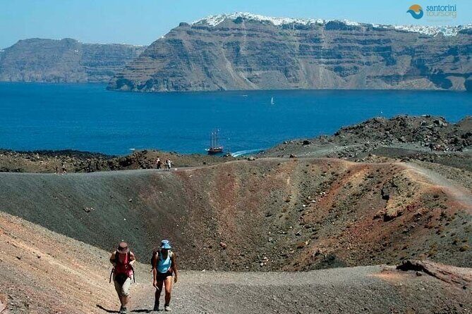 Santorini: Boat tour to Volcano, Hot Springs & Thirasia island - Palea Kameni hot springs: warm water, sulfur stains, and real swim time