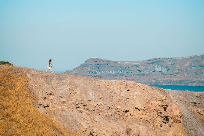 Santorini: Boat tour to Volcano, Hot Springs & Thirasia island - On board: restroom, noodles, towels, and a simple white wine break