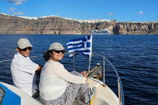 Santorini: Boat tour to Volcano, Hot Springs & Thirasia island - Nea Kameni volcano: great views, hard shoes, and no guide on the island