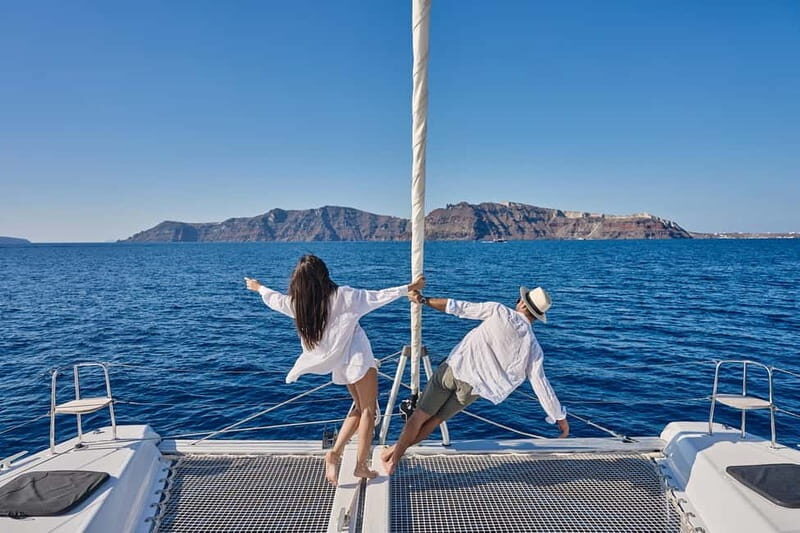 Santorini: Caldera Classic Catamaran Cruise w/ Meal & Drinks - Red Beach: Scarlet Rocks, Lunch, and Your First Real Swim