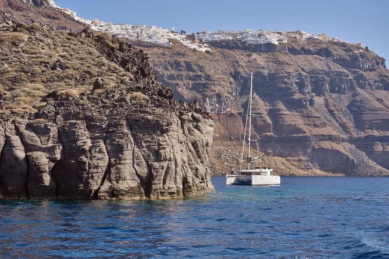 Santorini: Caldera Classic Catamaran Cruise w/ Meal & Drinks - Nea Kameni Volcano Islet: Where the Water Feels Different