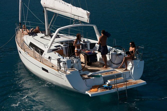 Santorini Caldera Private Sailing Boat Cruise - The onboard experience: food, drinks, and the crew vibe