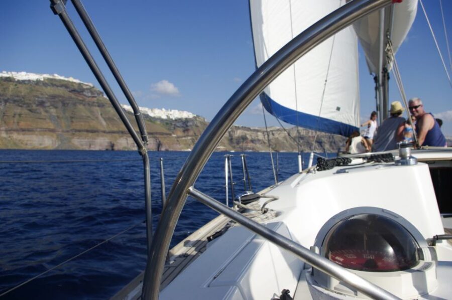 Santorini Caldera: Sunset Sailing Cruise with Meal - Indian Rock, the Lighthouse Views, and Sailing Inside the Caldera