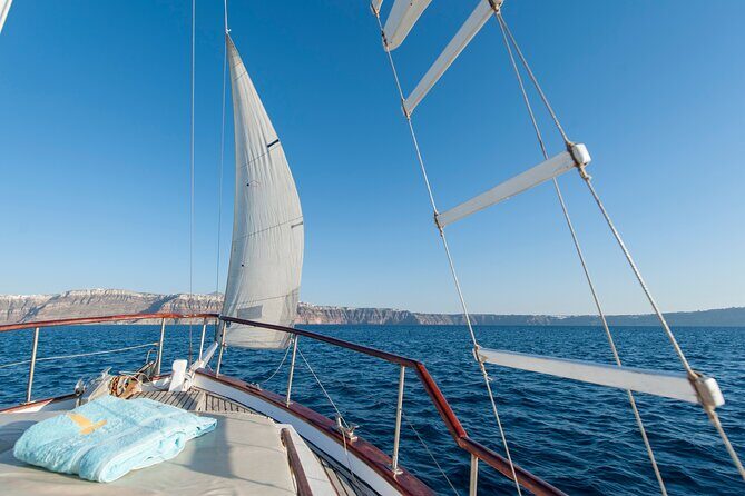 Santorini Caldera Sunset Traditional Cruise with Meal and Drinks - The rocky “what if”: bring realistic expectations for boat comfort