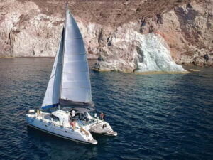 Santorini: Catamaran Cruise with Food and Drinks - How the 5-hour route plays out (day vs sunset timing)