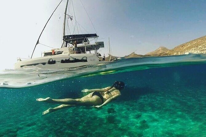 Santorini Catamaran Cruise with Fresh Meal and Open Bar - The vibe on board: space, music, and the sense of a small team